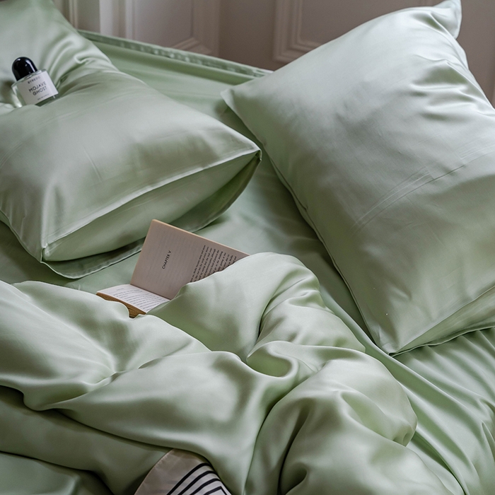 91家纺网 家纺一手货源 找家纺  沐晴家纺 2025春夏新款纯色兰精天丝四件套双拼单被套单床笠床单枕套 嫩芽绿