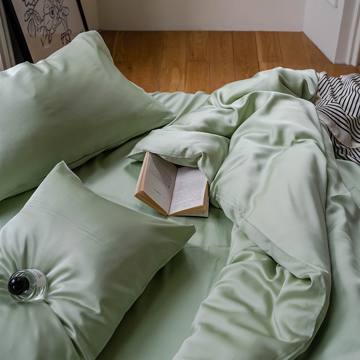 91家纺网 家纺一手货源 找家纺  沐晴家纺 2025春夏新款纯色兰精天丝四件套双拼单被套单床笠床单枕套 嫩芽绿
