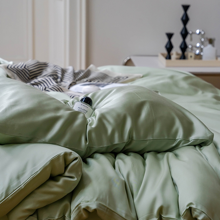 91家纺网 家纺一手货源 找家纺  沐晴家纺 2025春夏新款纯色兰精天丝四件套双拼单被套单床笠床单枕套 嫩芽绿