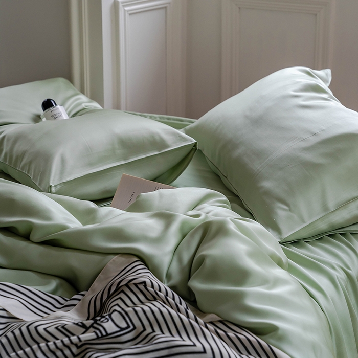 91家纺网 家纺一手货源 找家纺  沐晴家纺 2025春夏新款纯色兰精天丝四件套双拼单被套单床笠床单枕套 嫩芽绿