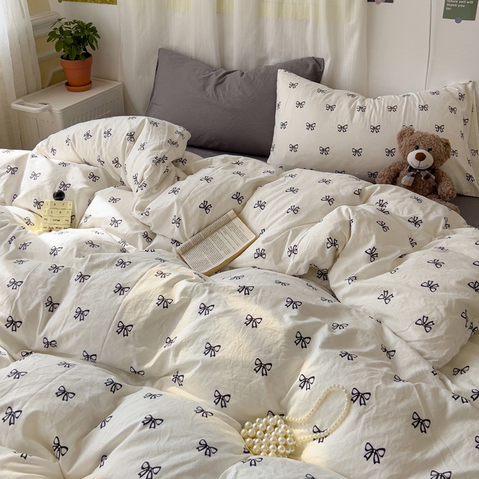 91家纺网 家纺一手货源 找家纺 仟人梦 2025新款水洗棉印花四件套 黑色蝴蝶结