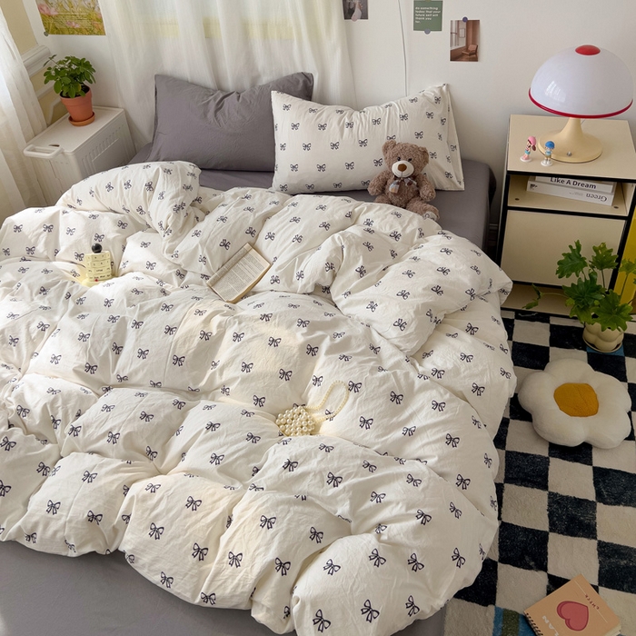 91家纺网 家纺一手货源 找家纺 仟人梦 2025新款水洗棉印花四件套 黑色蝴蝶结