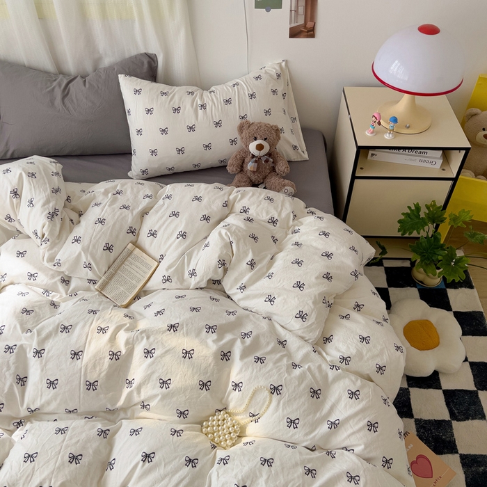 91家纺网 家纺一手货源 找家纺 仟人梦 2025新款水洗棉印花四件套 黑色蝴蝶结