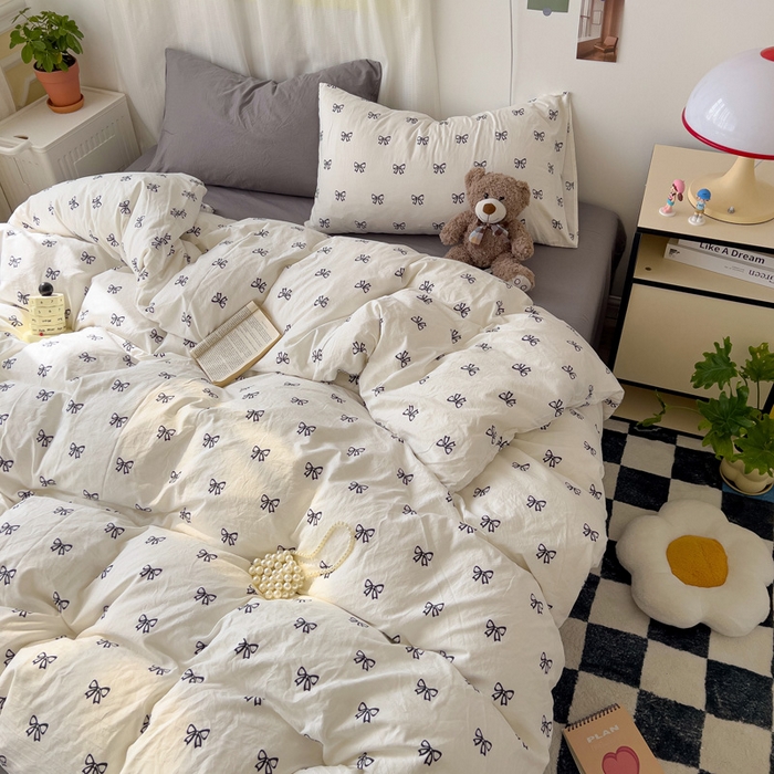 91家纺网 家纺一手货源 找家纺 仟人梦 2025新款水洗棉印花四件套 黑色蝴蝶结