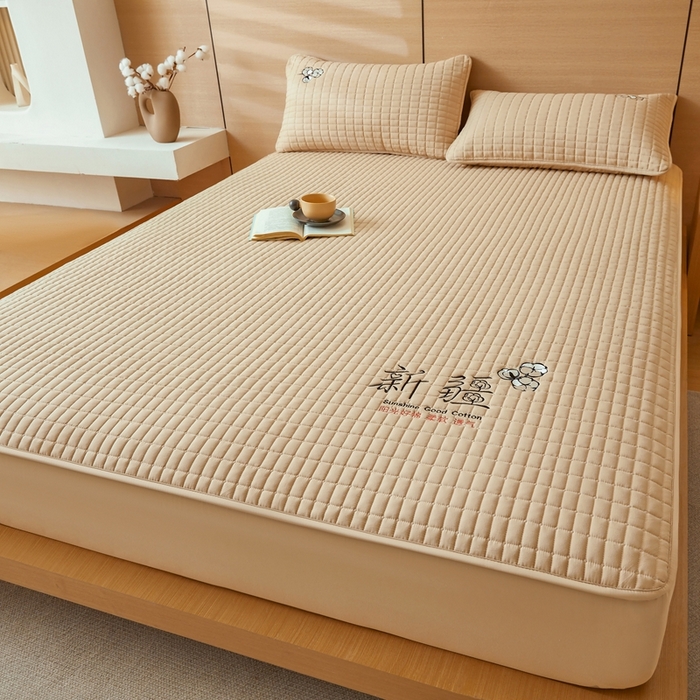 91家纺网 家纺一手货源 找家纺 锦眠床笠2025新款刺绣床笠新疆棉花填充-夹棉床笠 奶油咖