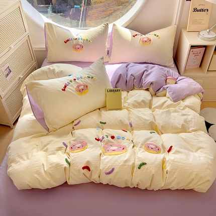 91家纺网 家纺一手货源 找家纺 韩秀家纺 2025新款115g超柔糯糯棉水洗棉毛巾绣四件套 甜甜圈-米黄拼浅紫