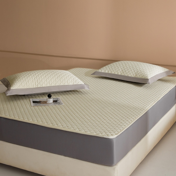 91家纺网 家纺一手货源 找家纺 由有2025新款60S长绒棉绗缝大豆夹棉床垫床褥床笠 平铺-奶油米