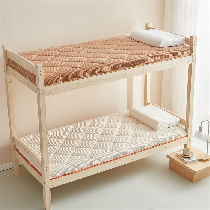 91家纺网 家纺一手货源 找家纺 2025新款柔软舒适魔法绒棉花床垫系列-学生款 奶昔白