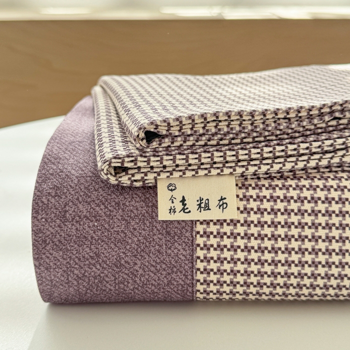 91家纺网 家纺一手货源 找家纺 简宜家居 2025新款宽边纯棉全棉老粗布床单 千鸟格-微醺紫