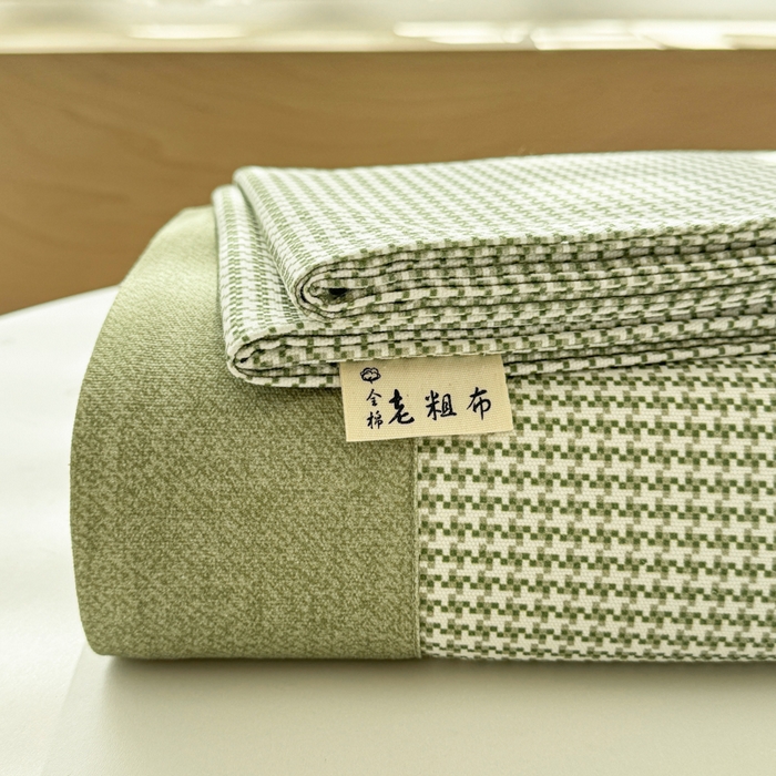 91家纺网 家纺一手货源 找家纺 简宜家居 2025新款宽边纯棉全棉老粗布床单 千鸟格-绿野宽边