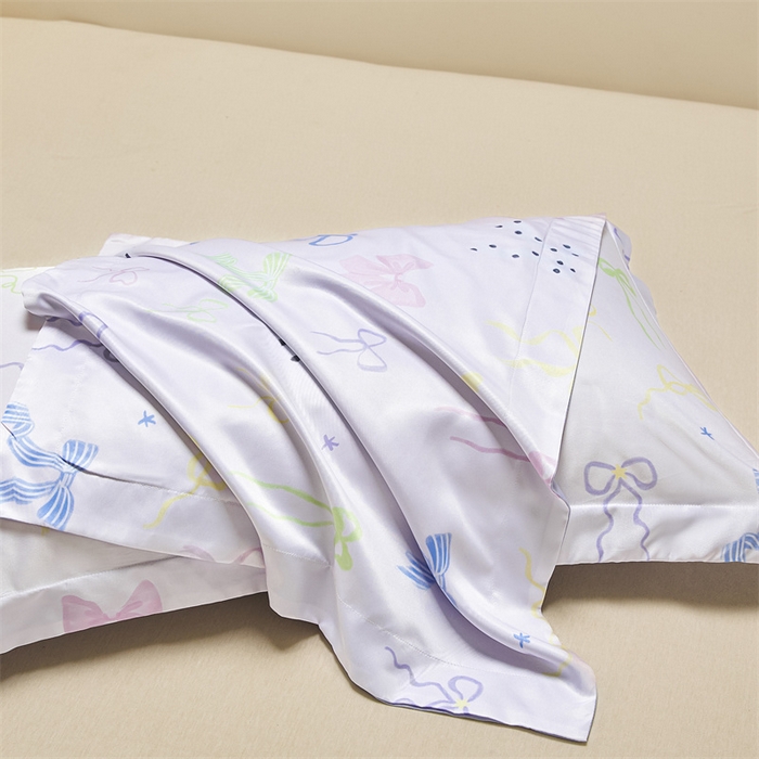 91家纺网 家纺一手货源 找家纺 笙意家纺 2025新款水洗真丝数码印花卡通枕套 蝴蝶结