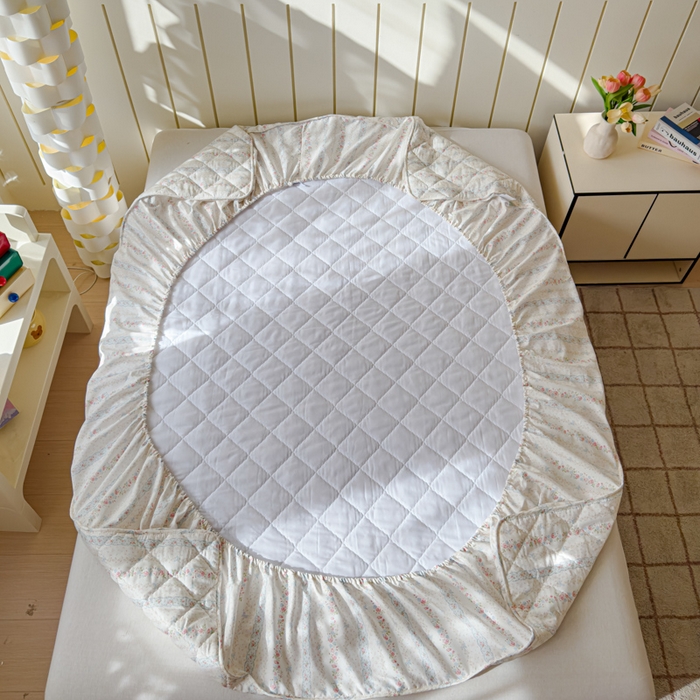 91家纺网 家纺一手货源 找家纺 U品汇 2025新款A类全棉夹棉防水床笠床罩单件隔尿透气床垫加厚防尘可水洗保护套 轻悠花梦