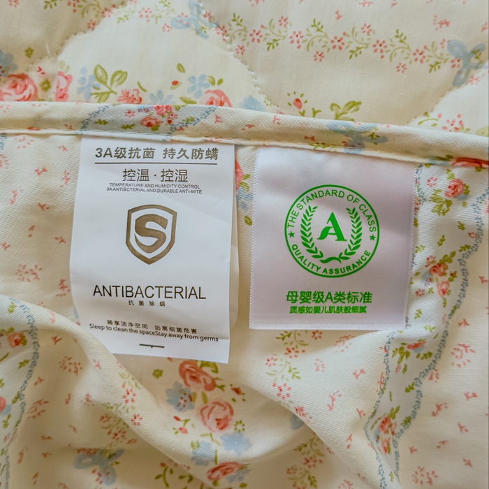 91家纺网 家纺一手货源 找家纺 U品汇 2025新款A类全棉夹棉防水床笠床罩单件隔尿透气床垫加厚防尘可水洗保护套 轻悠花梦