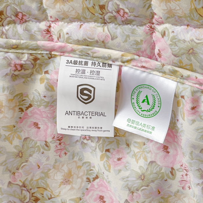 91家纺网 家纺一手货源 找家纺 U品汇 2025新款A类全棉夹棉防水床笠床罩单件隔尿透气床垫加厚防尘可水洗保护套 杏园暖秋粉