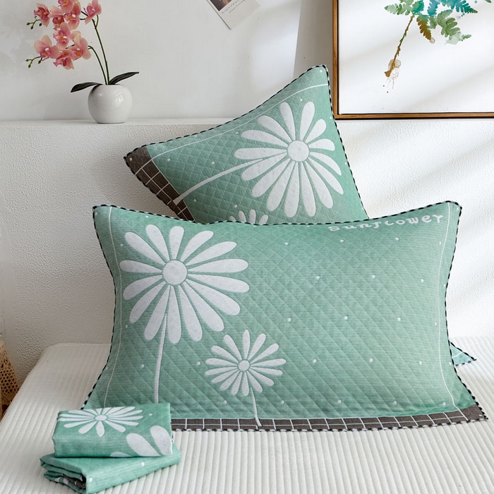 91家纺网 家纺一手货源 找家纺 朴尔家纺-毛巾被 2025新款蜂窝透气提花锁边立体枕巾 太阳花-绿