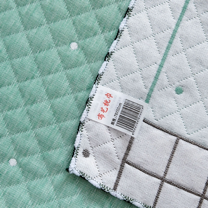 91家纺网 家纺一手货源 找家纺 朴尔家纺-毛巾被 2025新款蜂窝透气提花锁边立体枕巾 太阳花-绿