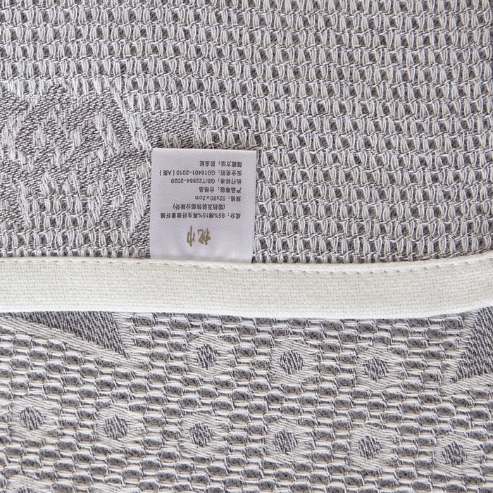 91家纺网 家纺一手货源 找家纺 朴尔家纺-毛巾被 2025新款全棉纱布蜂窝结构系列枕巾 君子莲-浅灰