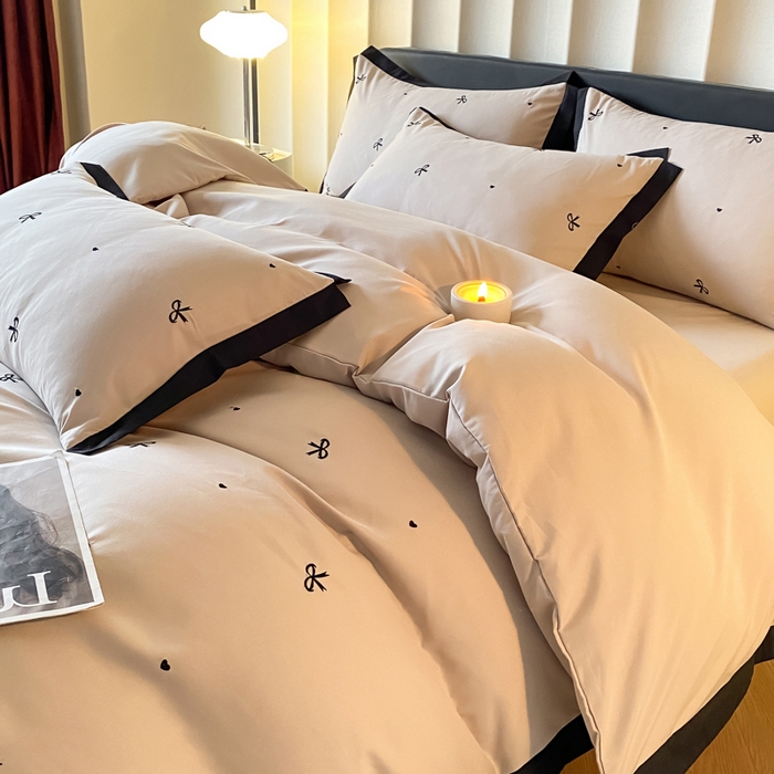 91家纺网 家纺一手货源 找家纺 米彩家纺 2025新款水洗磨毛四件套-蝴蝶结爱心系列 蝴蝶结浅香槟