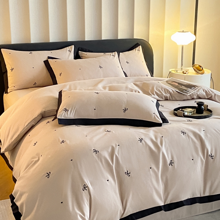 91家纺网 家纺一手货源 找家纺 米彩家纺 2025新款水洗磨毛四件套-蝴蝶结爱心系列 蝴蝶结浅香槟