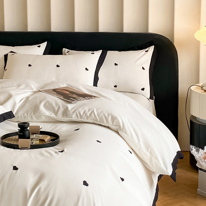 91家纺网 家纺一手货源 找家纺 米彩家纺 2025新款水洗磨毛四件套-蝴蝶结爱心系列 爱心奶昔白