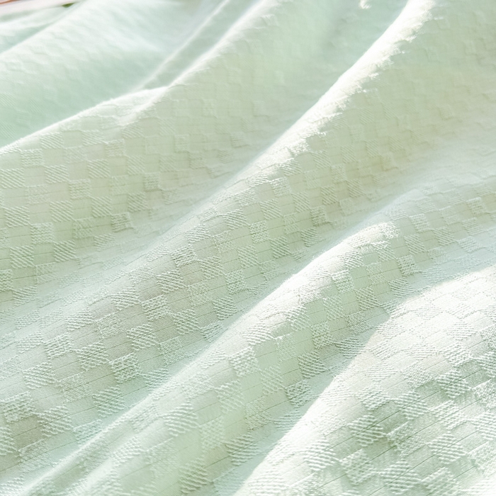 91家纺网 家纺一手货源 找家纺 芙绣 芙绣 2025新款七彩华夫格提花夏被四件套夏凉被空调被 果绿+灰