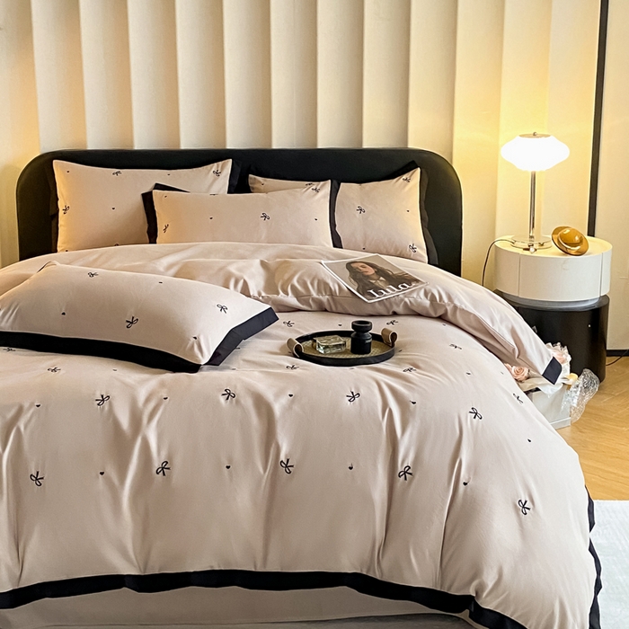 91家纺网 家纺一手货源 找家纺 米彩家纺 2025新款水洗磨毛四件套-蝴蝶结爱心系列 蝴蝶结浅香槟