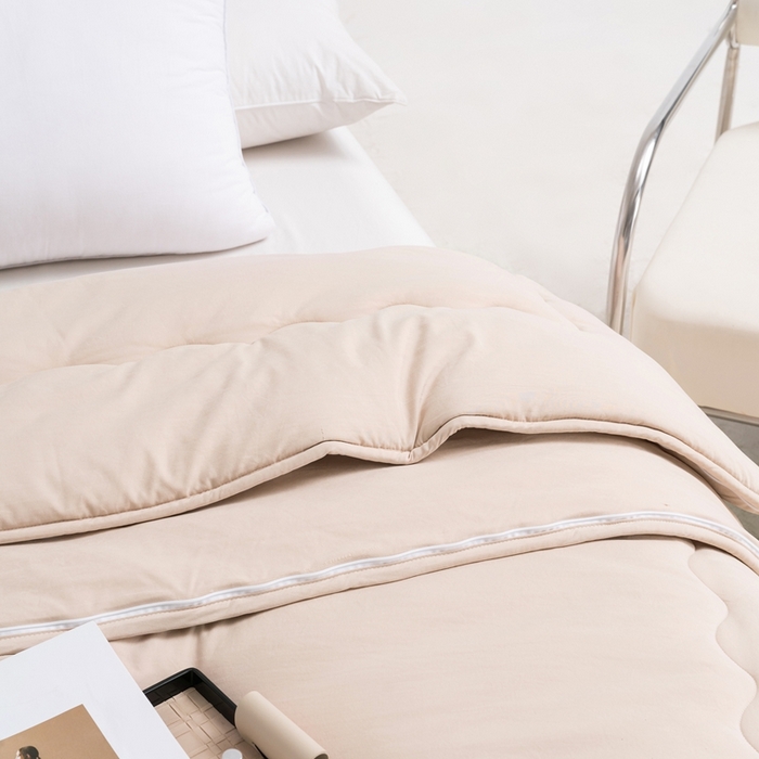 91家纺网 家纺一手货源 找家纺 易睡 2025新款A类水洗棉新疆棉花被子母被 驼色