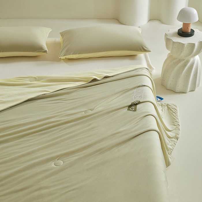 91家纺网 家纺一手货源 找家纺 金爱家2025新款A类高品质冰冰凉雪花冰感凉皮双面加倍透气孔氨纶凉感夏被 冰感凉皮-抹茶芒果（加倍透气）