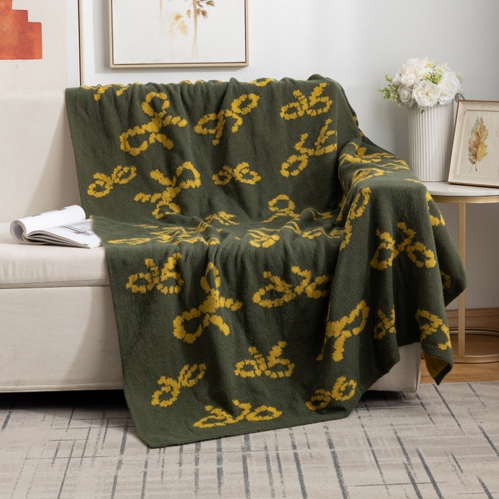 91家纺网 家纺一手货源 找家纺 （总）肖恩毯业 2025新款鹿毛绒针织毯蝴蝶结北欧毛毯复古沙发毯休闲毯子