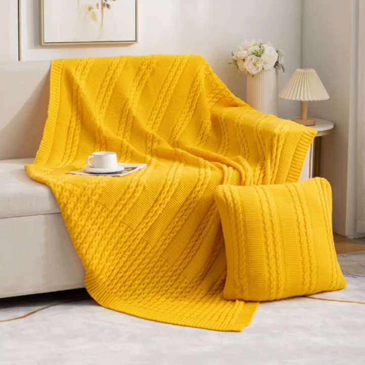 91家纺网 家纺一手货源 找家纺 （总）肖恩毯业 2025新款鹿毛绒针织毯纯色素色螺纹镂空苏头北欧毛毯复古沙发毯休闲毯子