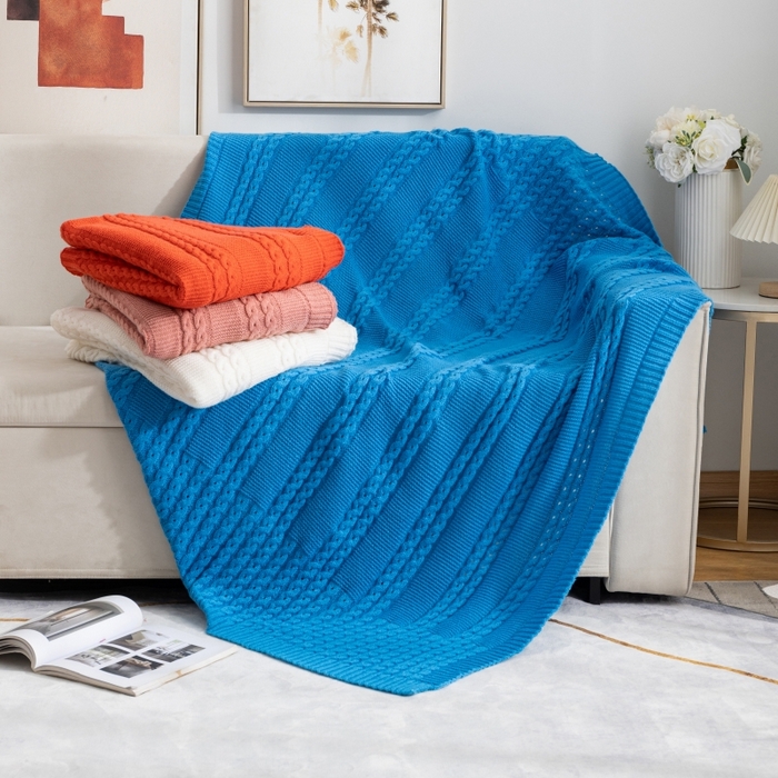 91家纺网 家纺一手货源 找家纺 肖恩毯业 2025新款鹿毛绒针织毯纯色素色螺纹镂空苏头北欧毛毯复古沙发毯休闲毯子 湖蓝色