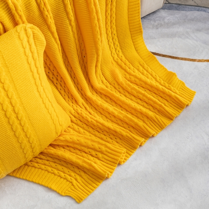 91家纺网 家纺一手货源 找家纺 肖恩毯业 2025新款鹿毛绒针织毯纯色素色螺纹镂空苏头北欧毛毯复古沙发毯休闲毯子 黄色
