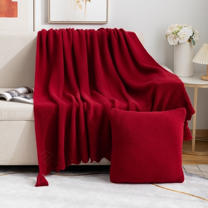 肖恩毯业 2025新款鹿毛绒针织毯纯色素色螺纹镂空苏头北欧毛毯复古沙发毯休闲毯子 大红