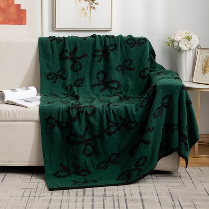 91家纺网 家纺一手货源 找家纺 （总）肖恩毯业 2025新款鹿毛绒针织毯蝴蝶结北欧毛毯复古沙发毯休闲毯子