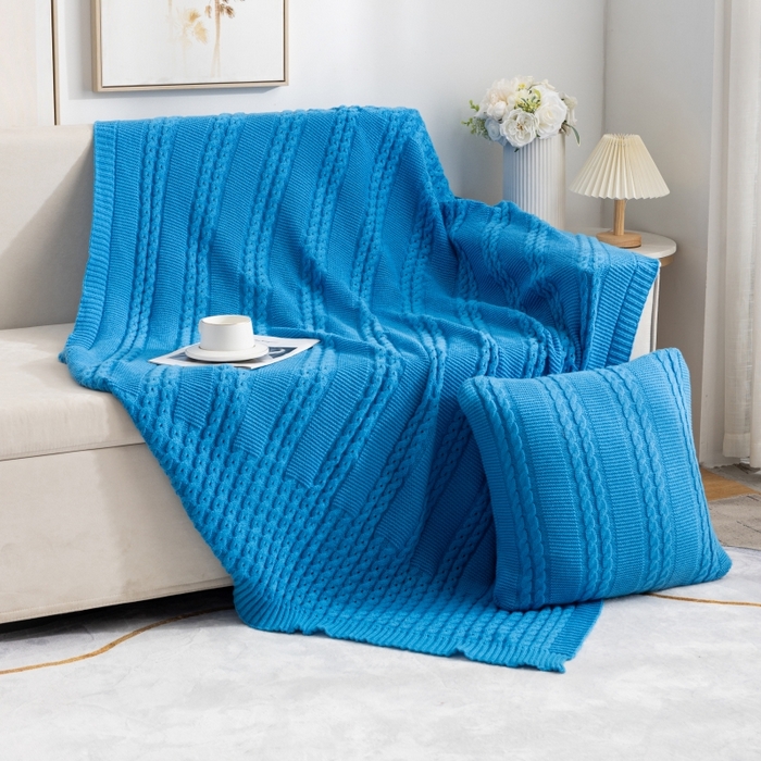 91家纺网 家纺一手货源 找家纺 肖恩毯业 2025新款鹿毛绒针织毯纯色素色螺纹镂空苏头北欧毛毯复古沙发毯休闲毯子 湖蓝色