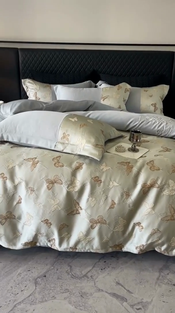 91家纺网 家纺一手货源 找家纺 换种生活 2025新款浮雕天丝夏被四件套 小蝴蝶-奶咖