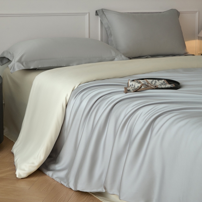 91家纺网 家纺一手货源 找家纺 涵宸2025新款天丝-天丝棉-纯色四件套-场景1 时尚灰+象牙白