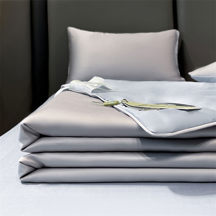 91家纺网 家纺一手货源 找家纺 雯豆天丝夏被纯色拼色A类莱赛尔凉感被子轻奢夏凉被子四件套 洛神珠-轻奢灰+雾霾蓝