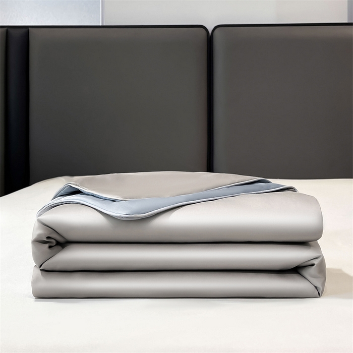 91家纺网 家纺一手货源 找家纺 雯豆天丝夏被纯色拼色A类莱赛尔凉感被子轻奢夏凉被子四件套 洛神珠-轻奢灰+雾霾蓝