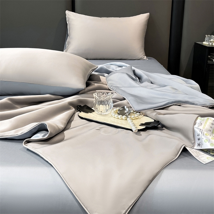 91家纺网 家纺一手货源 找家纺 雯豆天丝夏被纯色拼色A类莱赛尔凉感被子轻奢夏凉被子四件套 洛神珠-轻奢灰+雾霾蓝