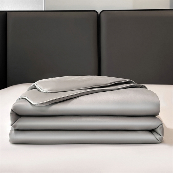 91家纺网 家纺一手货源 找家纺 雯豆天丝夏被纯色拼色A类莱赛尔凉感被子轻奢夏凉被子四件套 洛神珠-轻奢灰