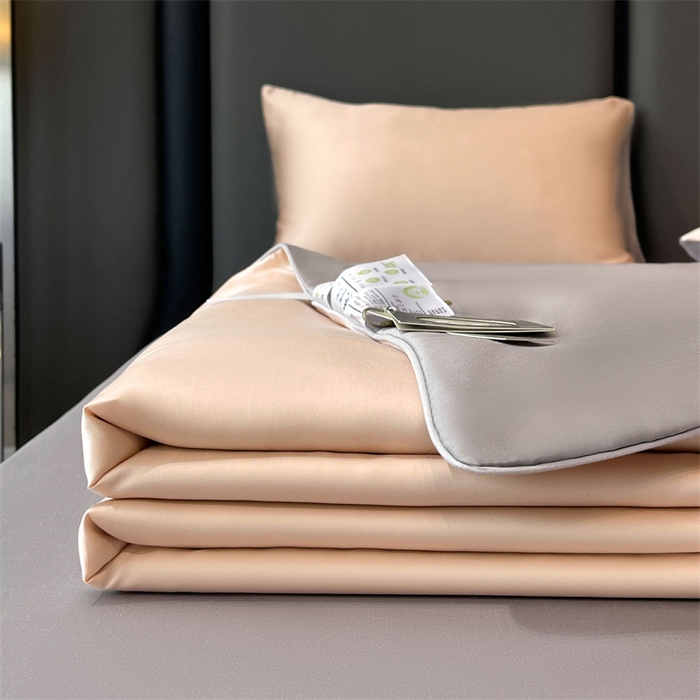 91家纺网 家纺一手货源 找家纺 雯豆天丝夏被纯色拼色A类莱赛尔凉感被子轻奢夏凉被子四件套 洛神珠-香槟金+轻奢灰