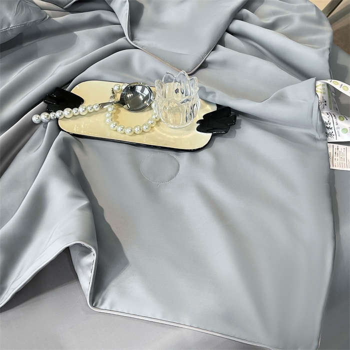 91家纺网 家纺一手货源 找家纺 雯豆天丝夏被纯色拼色A类莱赛尔凉感被子轻奢夏凉被子四件套 洛神珠-浅灰