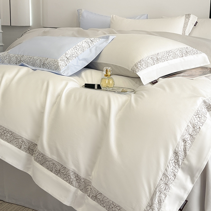 91家纺网 家纺一手货源 找家纺 2025新款A类长绒棉夹棉床盖床笠四件套全棉纯棉纯色绗绣四季款保护罩高级感纯色床上用品 诺兰-白灰