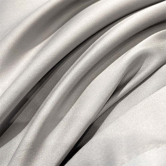 91家纺网 家纺一手货源 找家纺 雯豆天丝夏被纯色拼色A类莱赛尔凉感被子轻奢夏凉被子四件套 洛神珠-轻奢灰+雾霾蓝