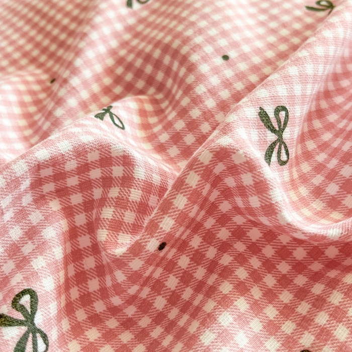 91家纺网 家纺一手货源 找家纺 雅眠居 2025爆款针织棉双层纱印花床盖四件套 粉格蝴蝶结