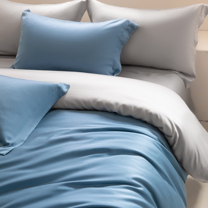 91家纺网 家纺一手货源 找家纺 涵宸家纺 2025新款天丝-天丝棉-纯色四件套-场景2 星耀兰+时尚灰