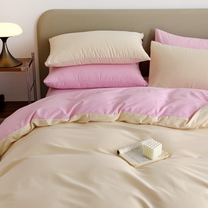 91家纺网 家纺一手货源 找家纺 2025年纯色双拼60支纯棉被套 奶白+白桃粉