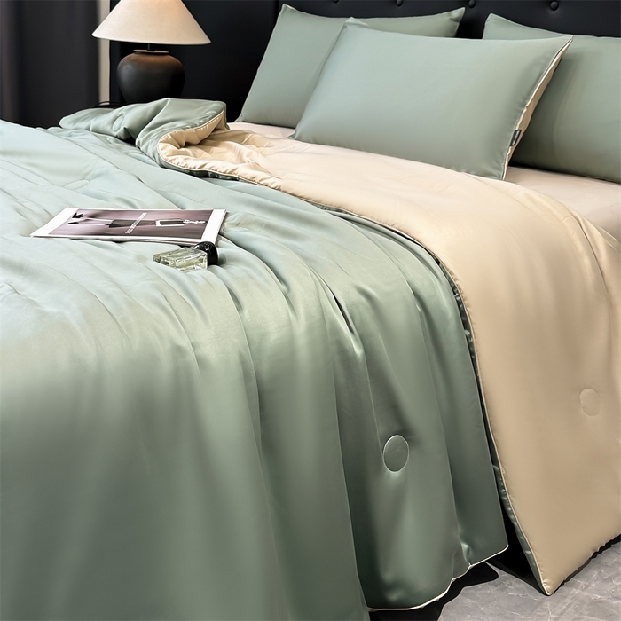 91家纺网 家纺一手货源 找家纺 金鹰 2025新款A类莱赛尔50天丝拼色空调被大豆夏被四件套 翡翠绿