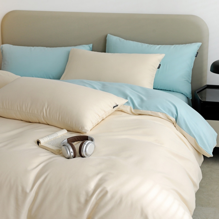 91家纺网 家纺一手货源 找家纺 2025年纯色双拼60支纯棉被套 奶白+婴儿蓝